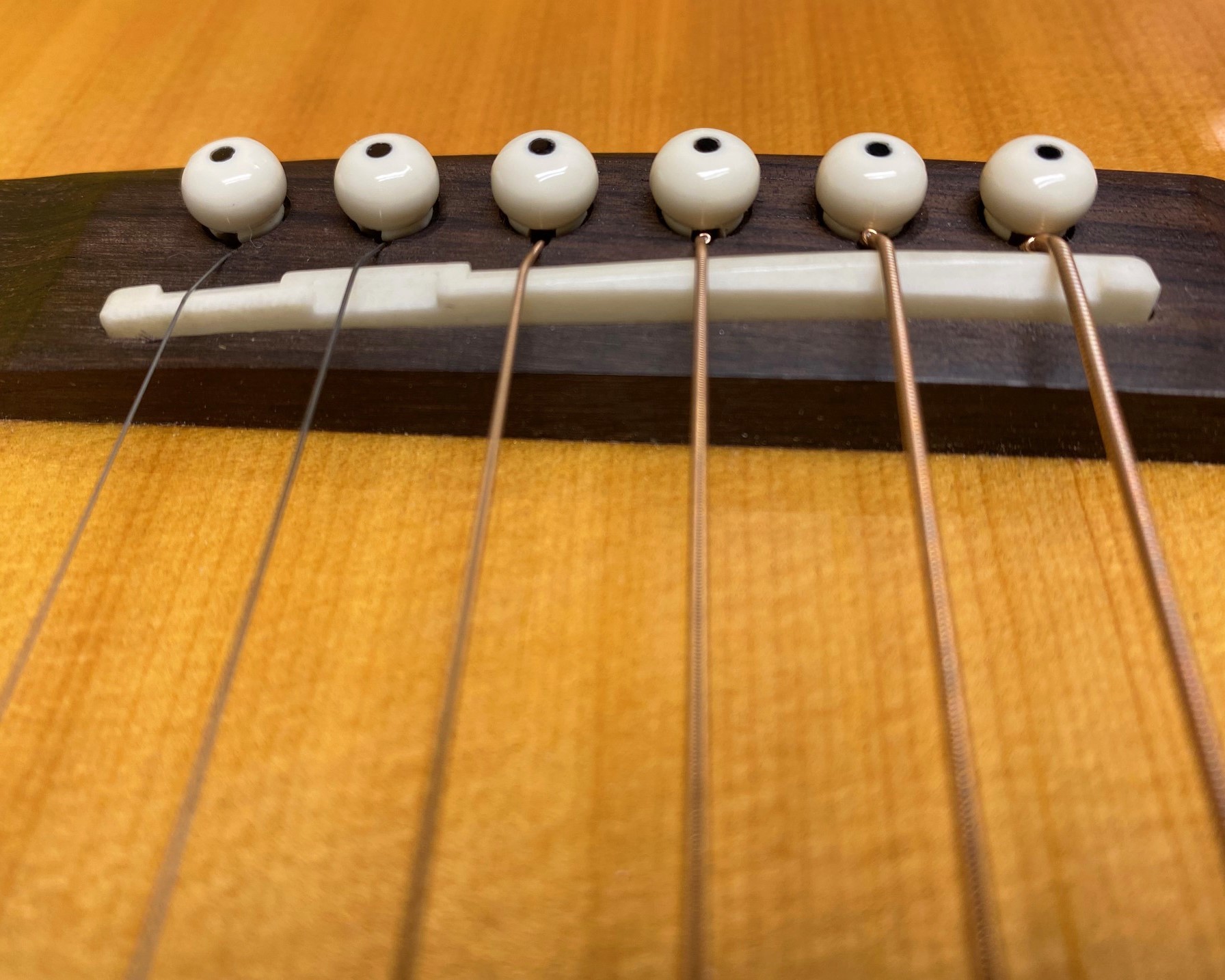 A compensated bone saddle can improve your guitar's tone and intonation greatly.